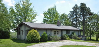 Home Overlooking Pond - Country homes for sale and luxury real estate including horse farms and property in the Caledon and King City areas near Toronto